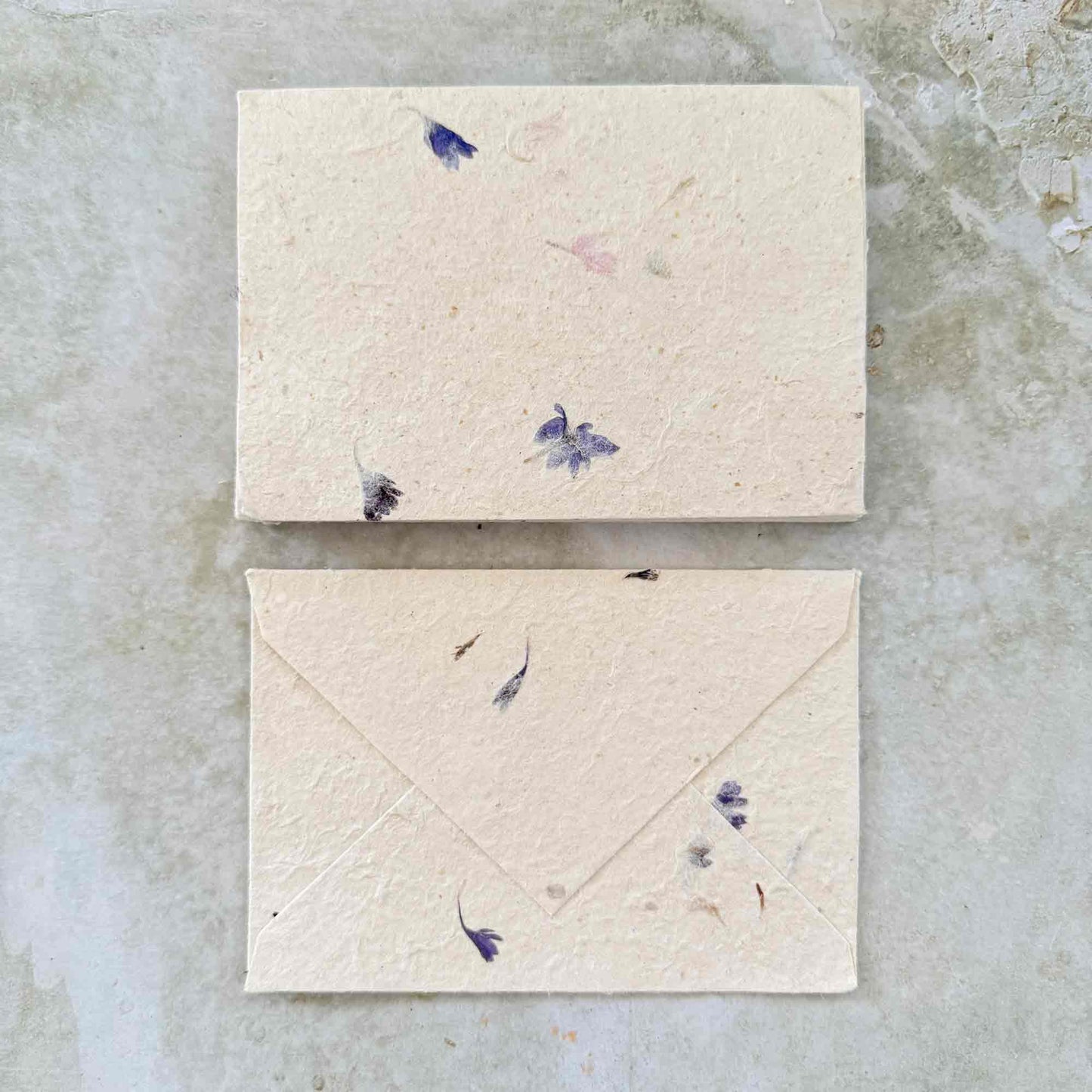Handmade lokta paper envelopes with cornflower petals