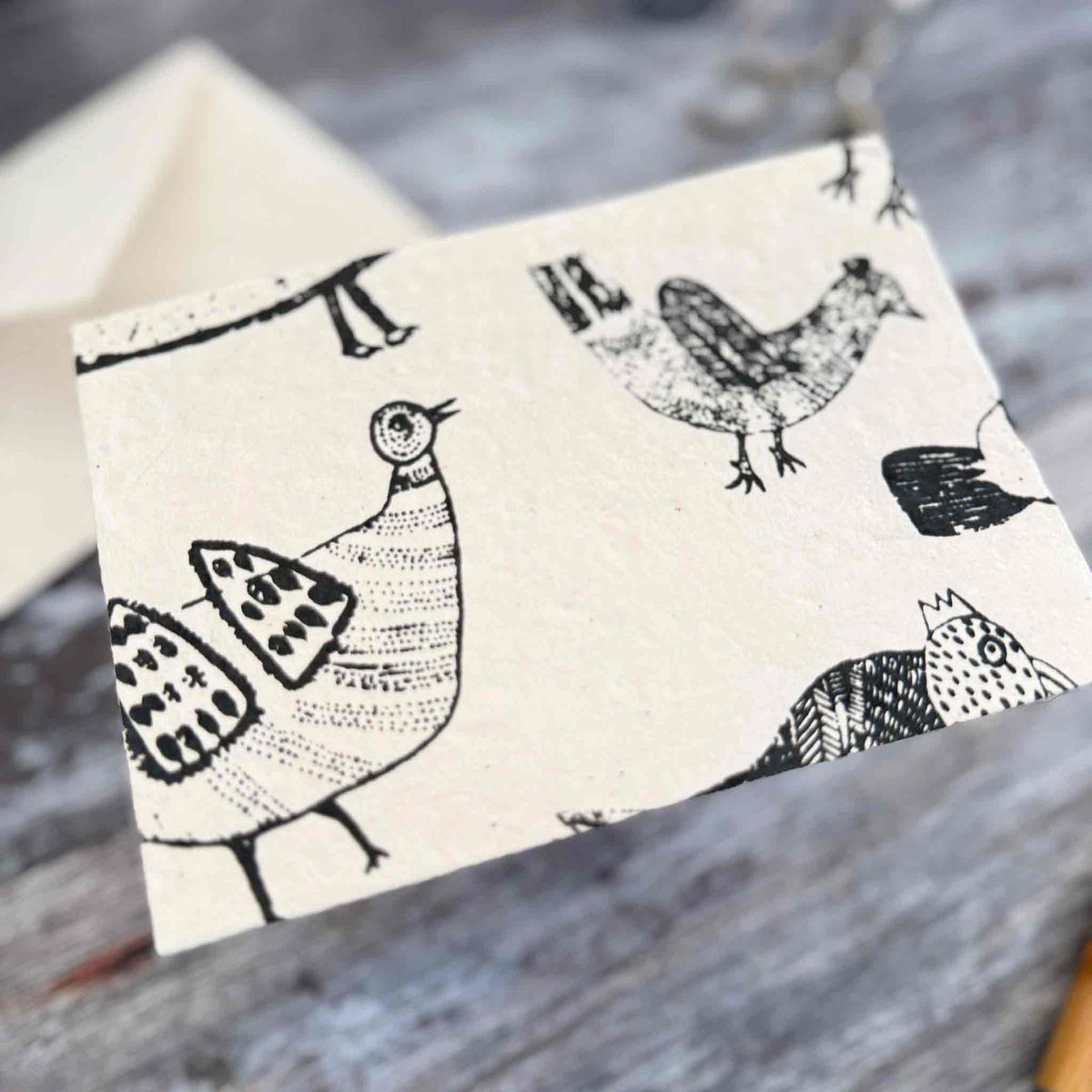 Chicken Lokta paper notecard with quirky black illustrated hens and matching envelope