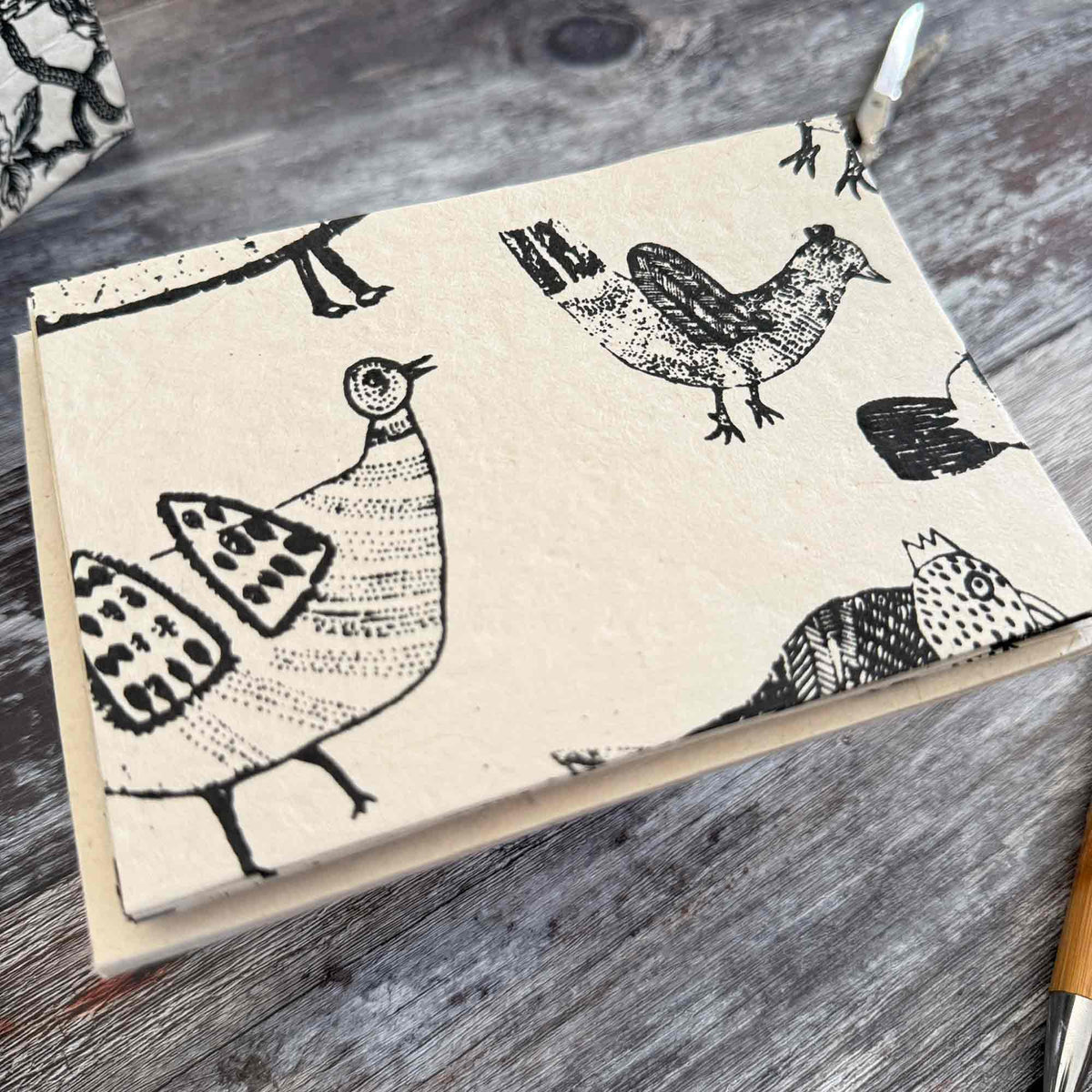 Set of handmade chicken note cards and envelopes made from natural Lokta paper