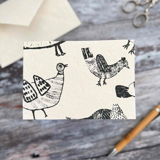 Handmade blank chicken card with black hen illustrations on traditional Lokta paper