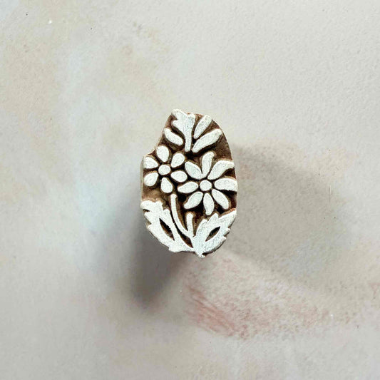 A pretty little Indian wood block stamp with a flower design