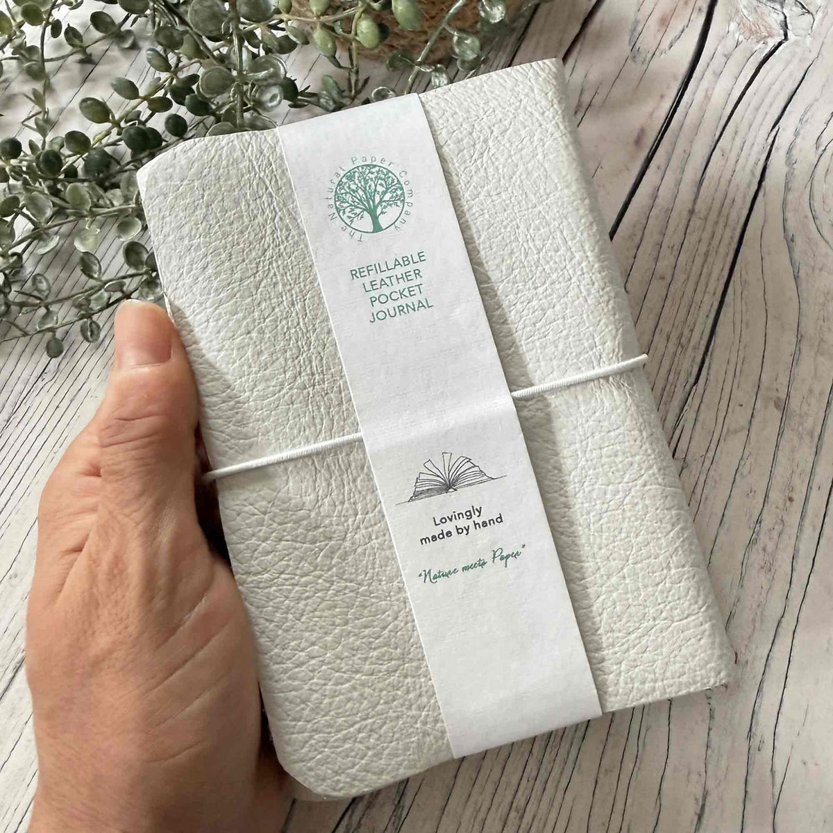 Handmade ivory A6 refillable leather journal with coordinating elastic closure