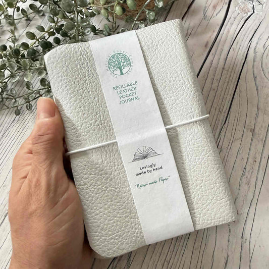 Handmade ivory A6 refillable leather journal with coordinating elastic closure