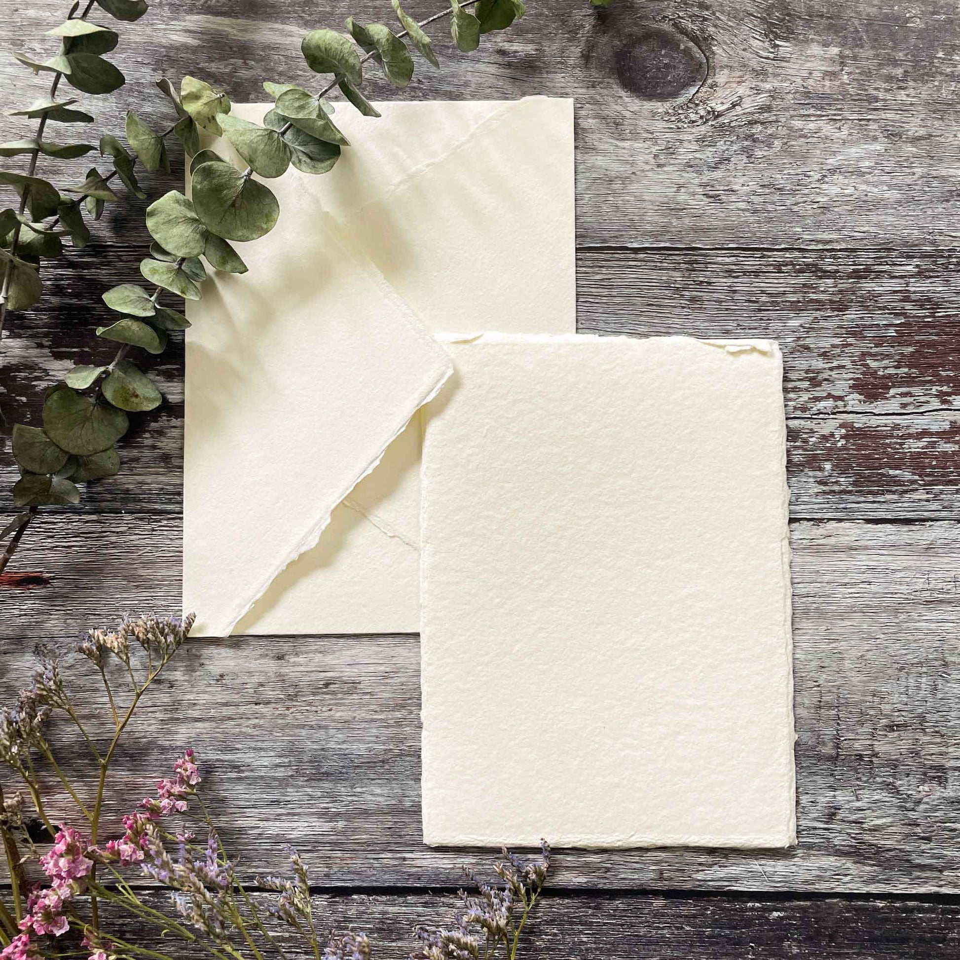 Handmade cotton rag paper and envelope in ivory.  Deckled edge recycled card for invitations, correspondence and calligraphy.  By The Natural Paper Company