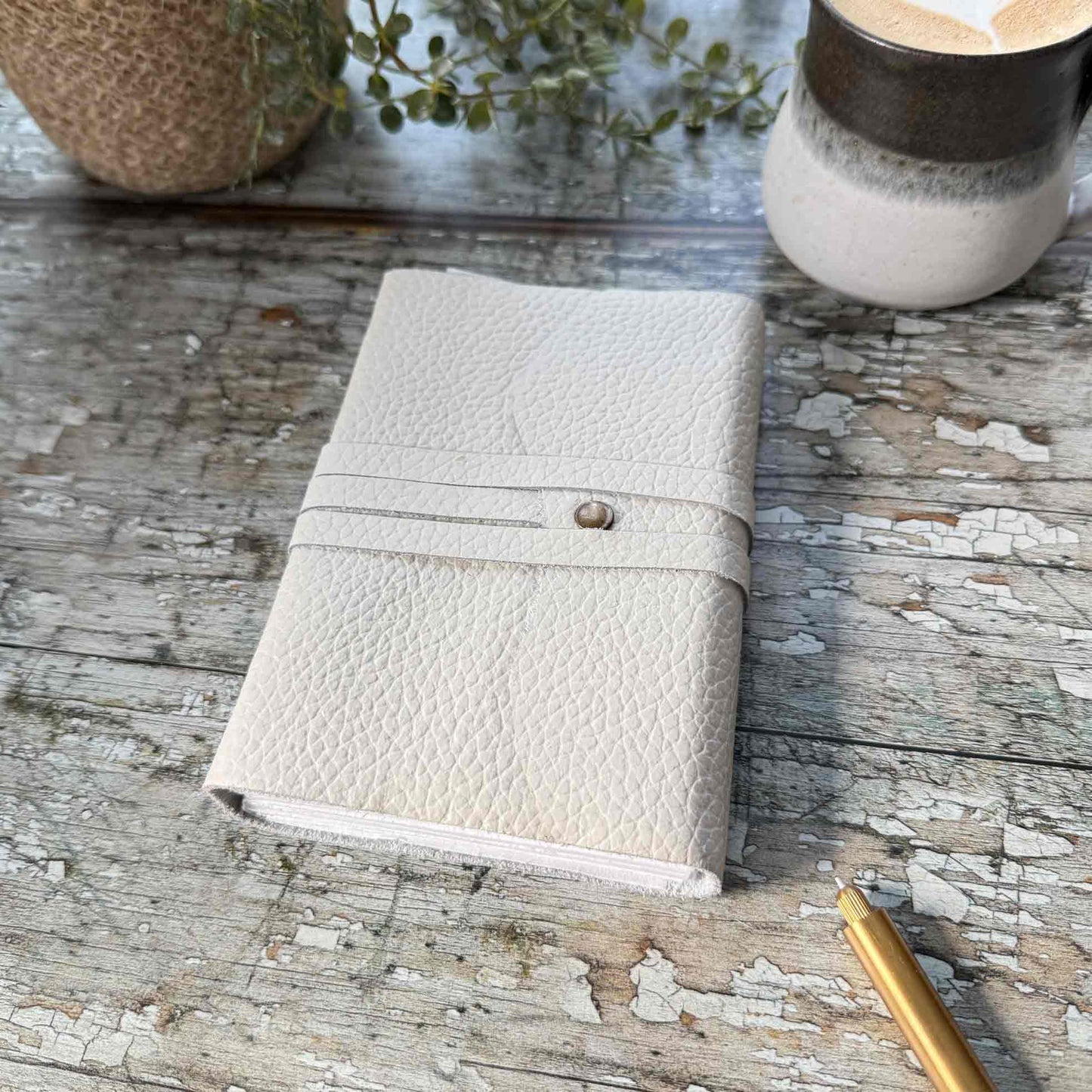 ivory leather notebook in gift bag
