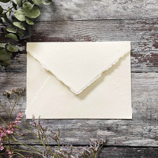 handmade paper envelope with a deckled edge.  Ivory envelope made from recycled cotton rag fibres.  By The Natural Paper Company