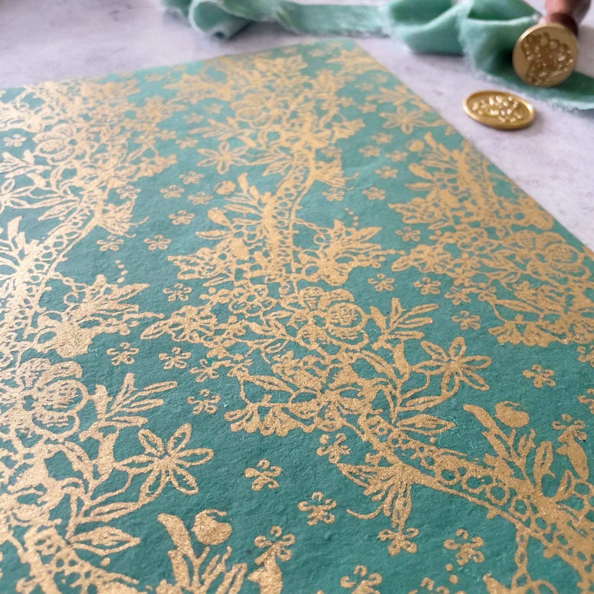 Fleur lustre decorative paper in jade green and gold.   Recycled paper for crafts.  By The Natural Paper Company.