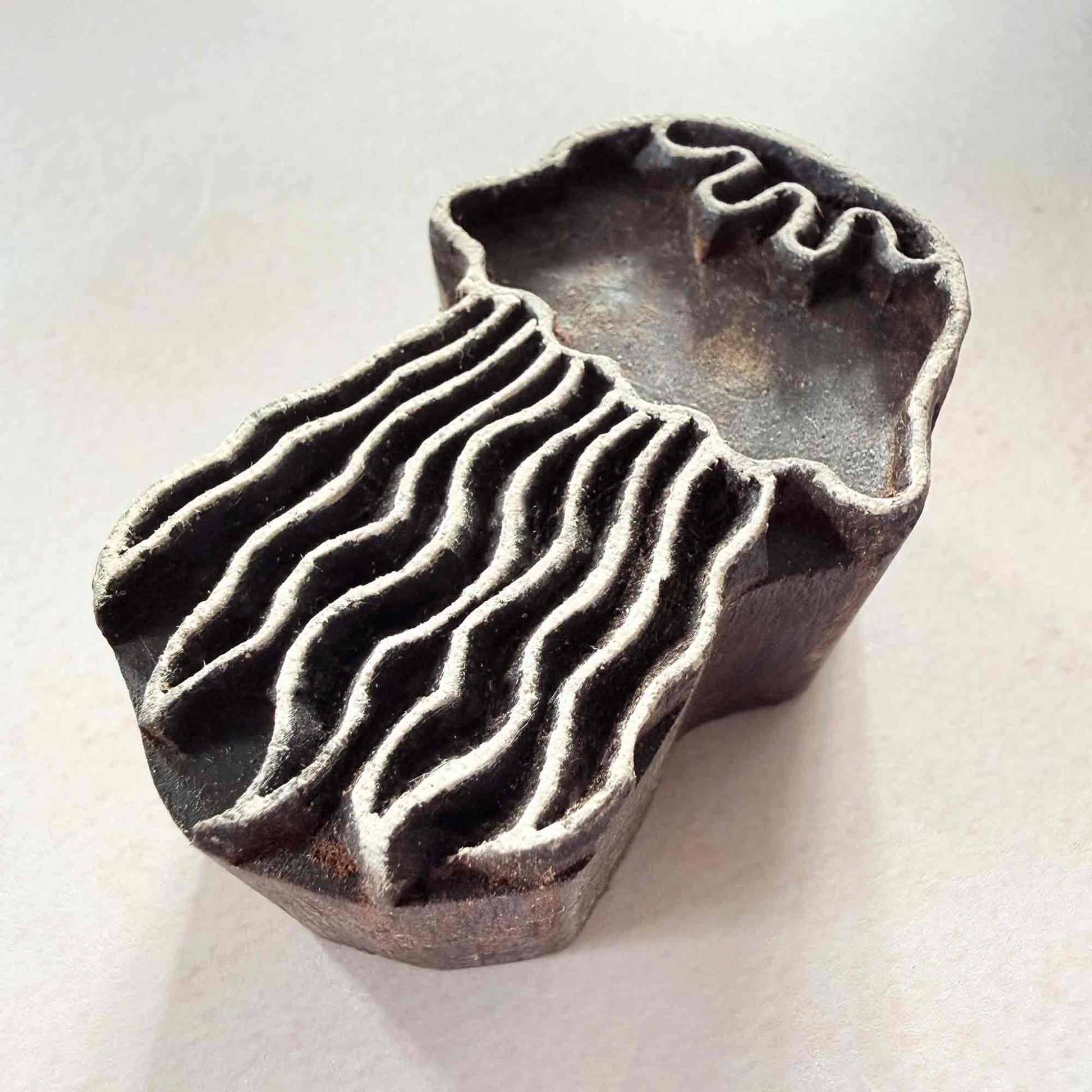 Jellyfish handmade wooden stamp with flowing hand-carved tentacle design