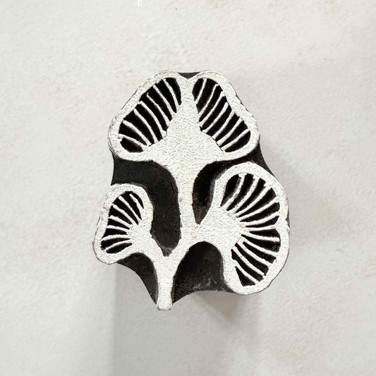 Kelp Indian Wood Block Stamp featuring three seaweed-inspired forms with fine carved radiating lines.
