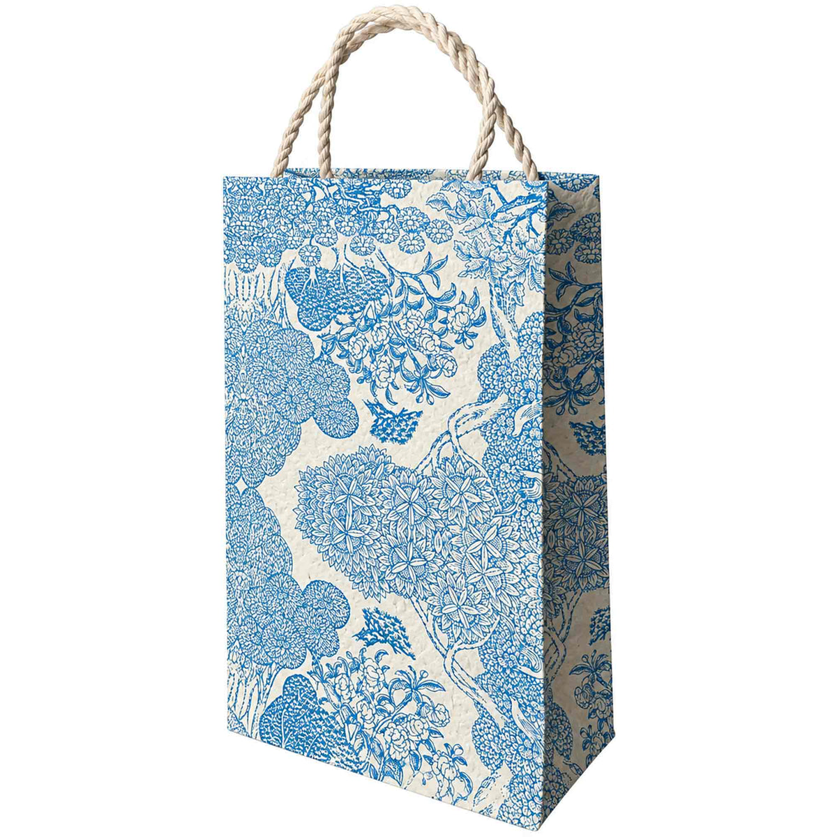 Large Niwa handmade Lokta paper gift bag with detailed blue floral and tree pattern on natural ivory paper.