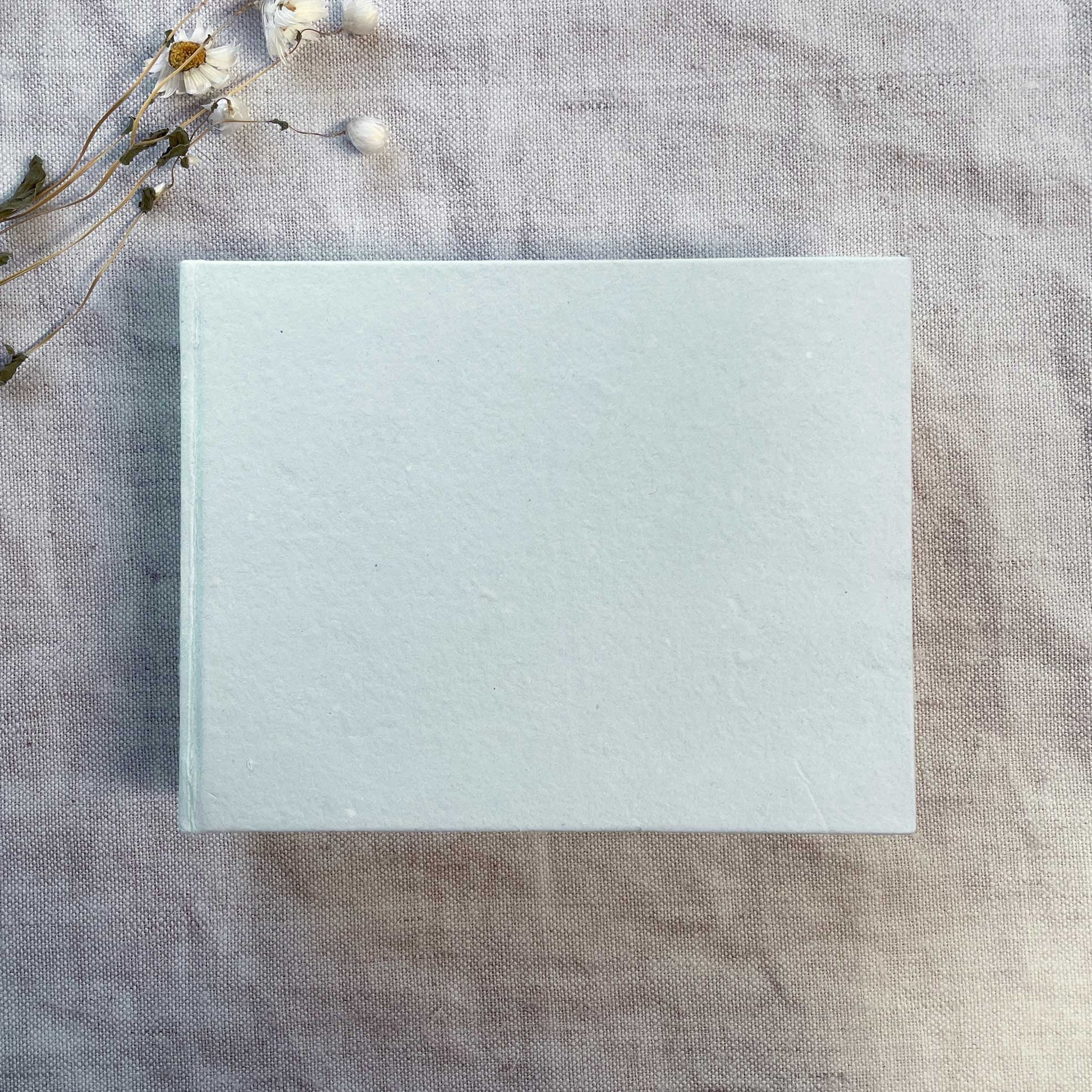 Blank journal in light blue.  Blank handmade paper guest book to decorate yourself. Hand made from recycled cotton rag paper.  by The Natural Paper Company