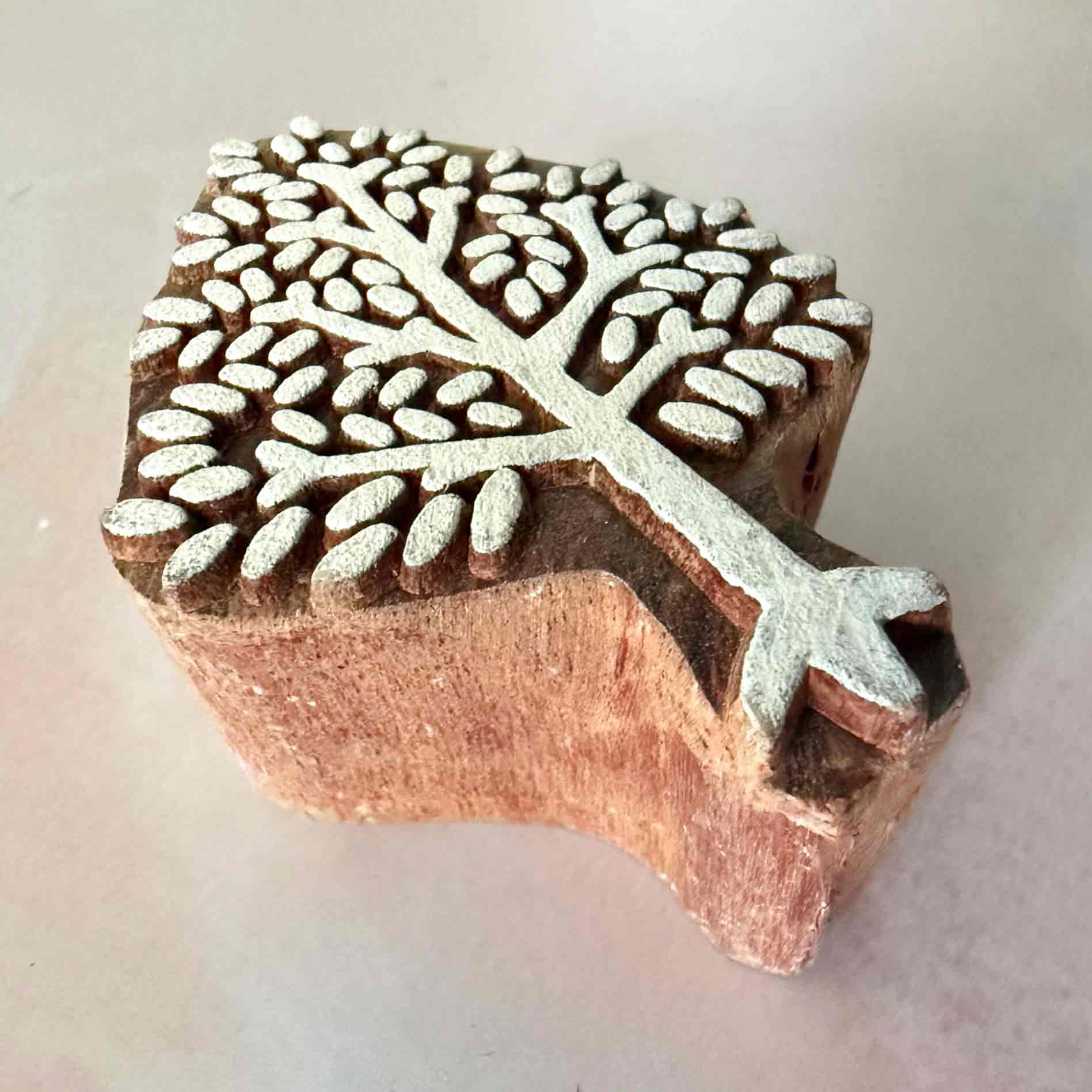 wooden stamp with a tree design