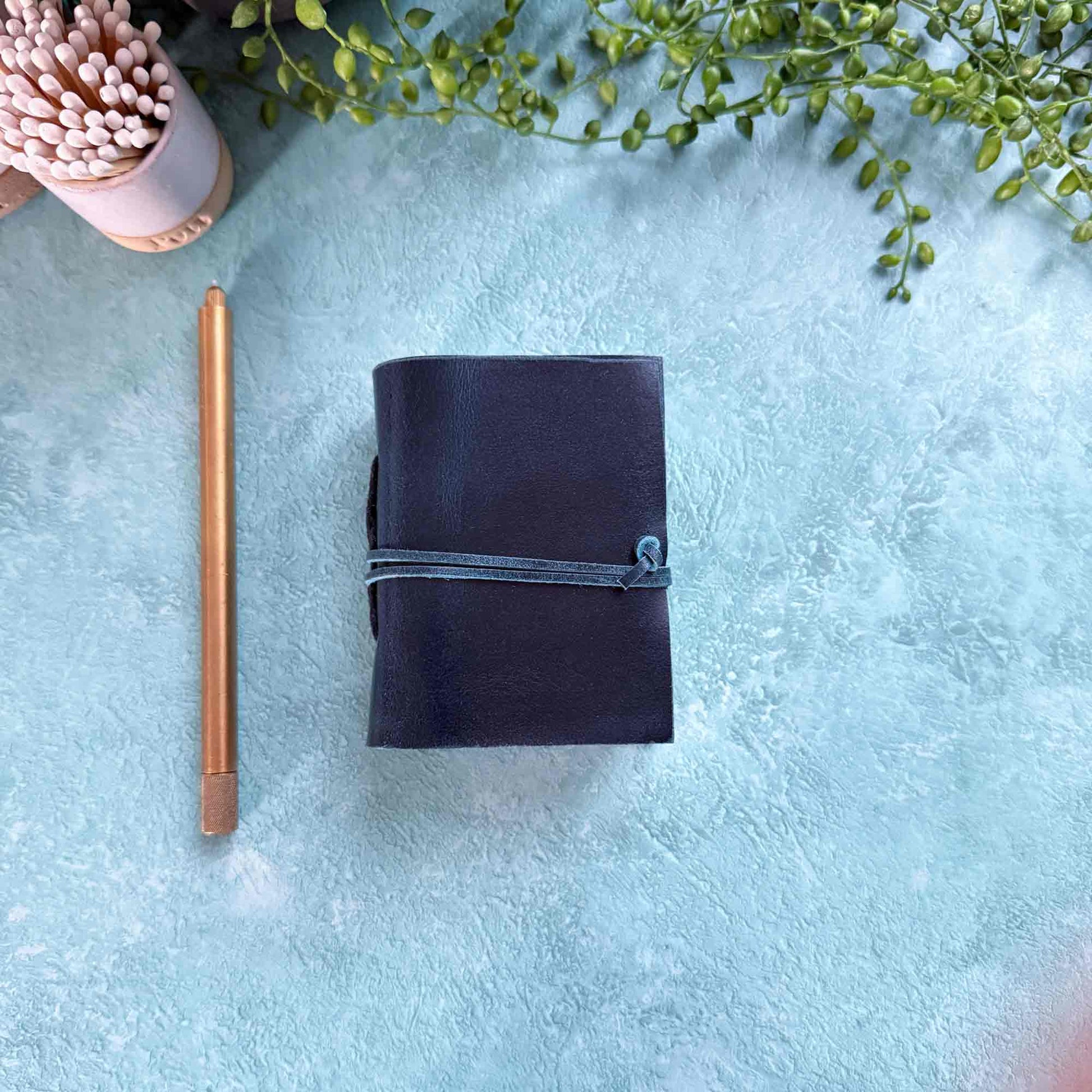 tiny handmade leather notebook in navy