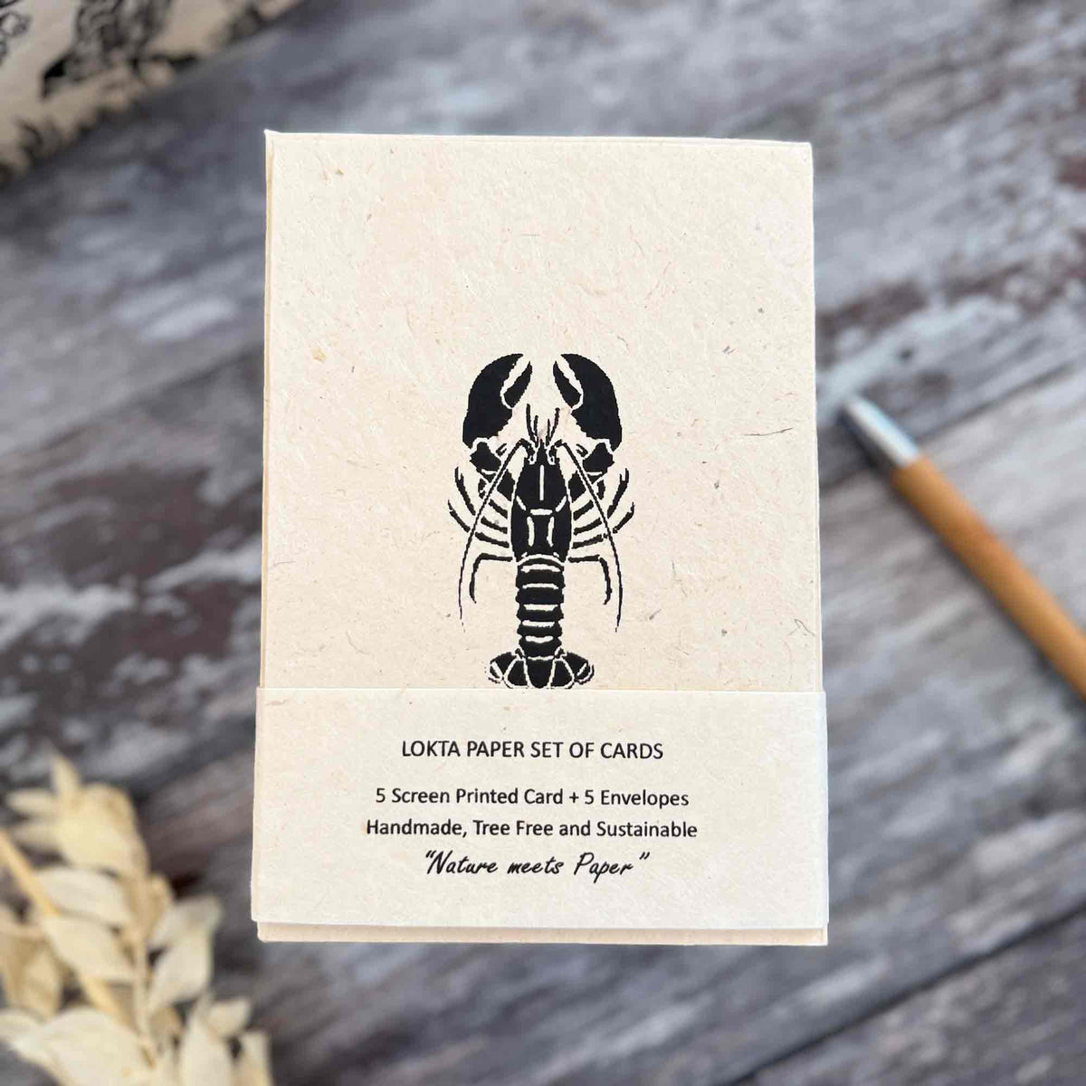Handmade lobster cards and envelopes made from sustainable Lokta paper with black screen printed lobster design