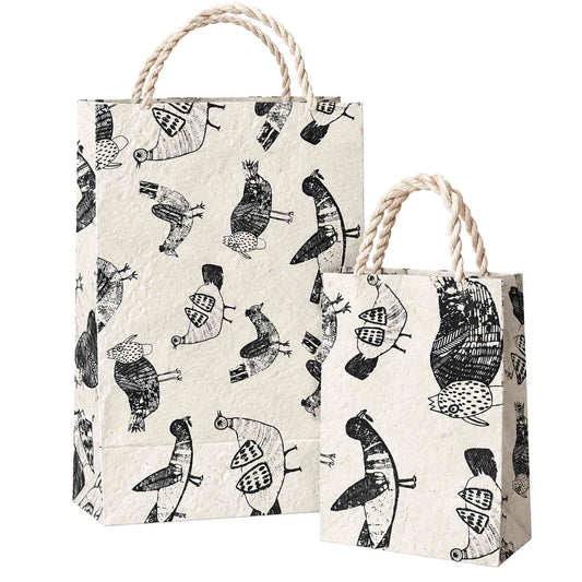 Henrietta handmade paper gift bags in small and large sizes with quirky black chicken prints and natural rope handles.