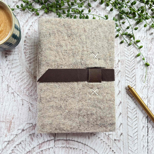 Handmade A5 journal, felted wool cover with leather detailing, Lokta paper pages, crafted in Nepal