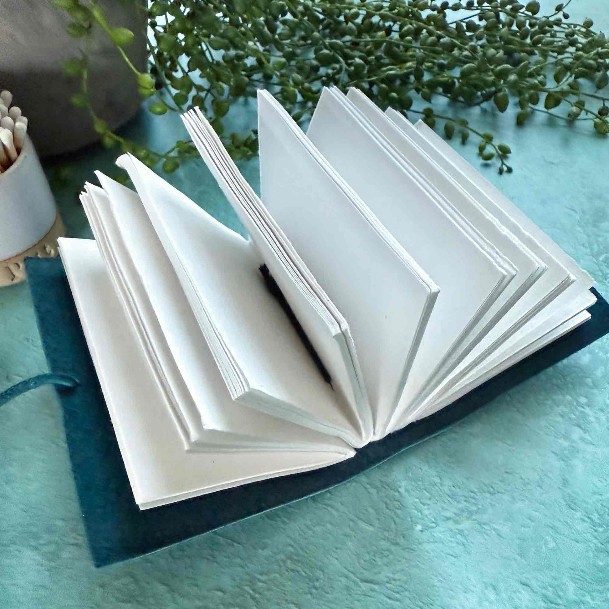 small handmade leather notebook in navy