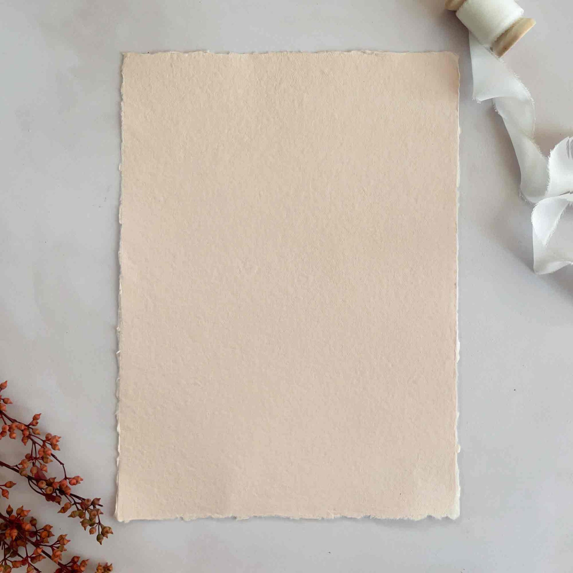 A4 cotton rag paper with deckled edges.  Blush pink handmade paper and card by The Natural Paper Company