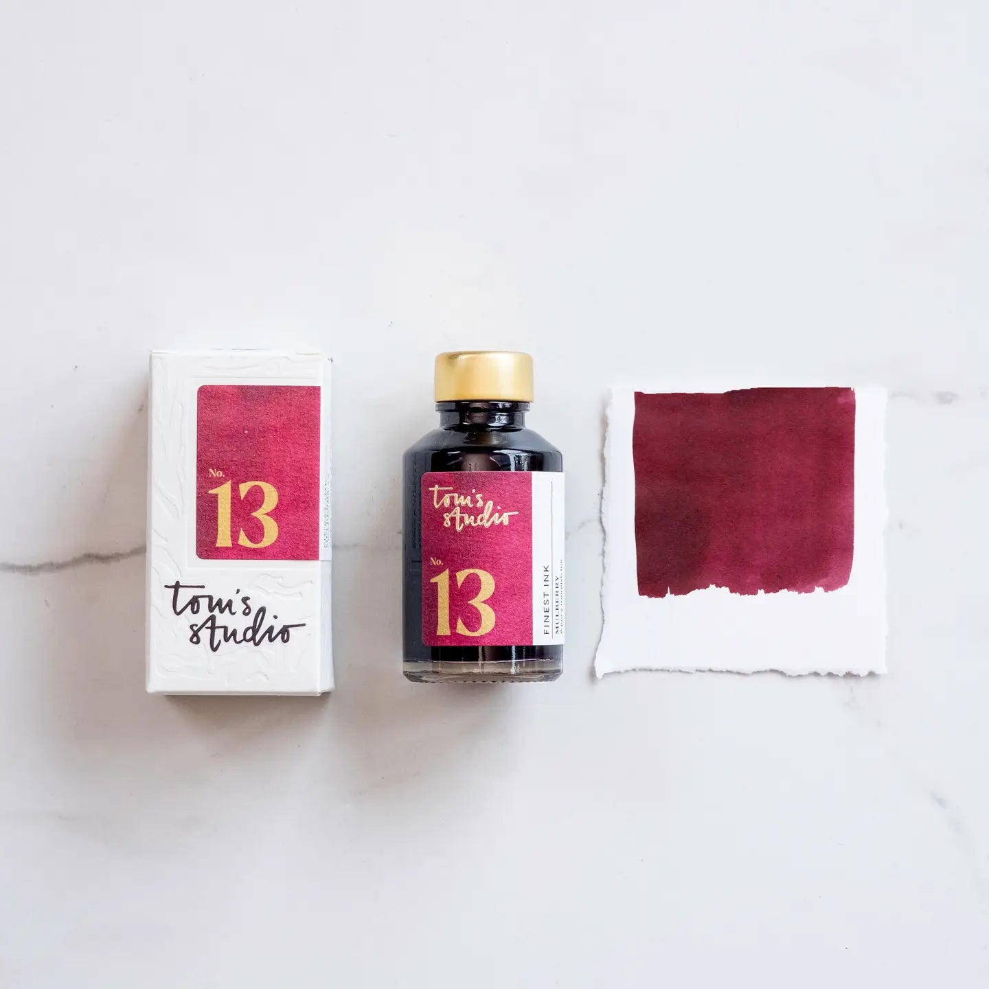 mulberry red water based ink for fountain pens and fine liners.  Tom's Studio Inks in a Glass Bottle