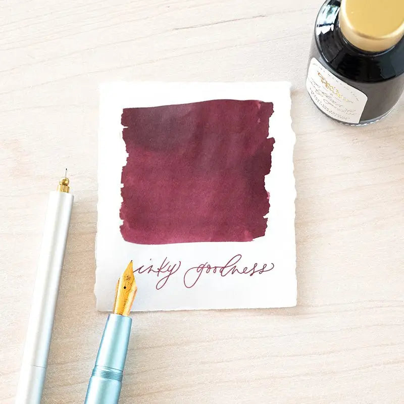 Mulberry red fountain pen ink by Tom's Studio.  Suitable for refillable pens and fine liners