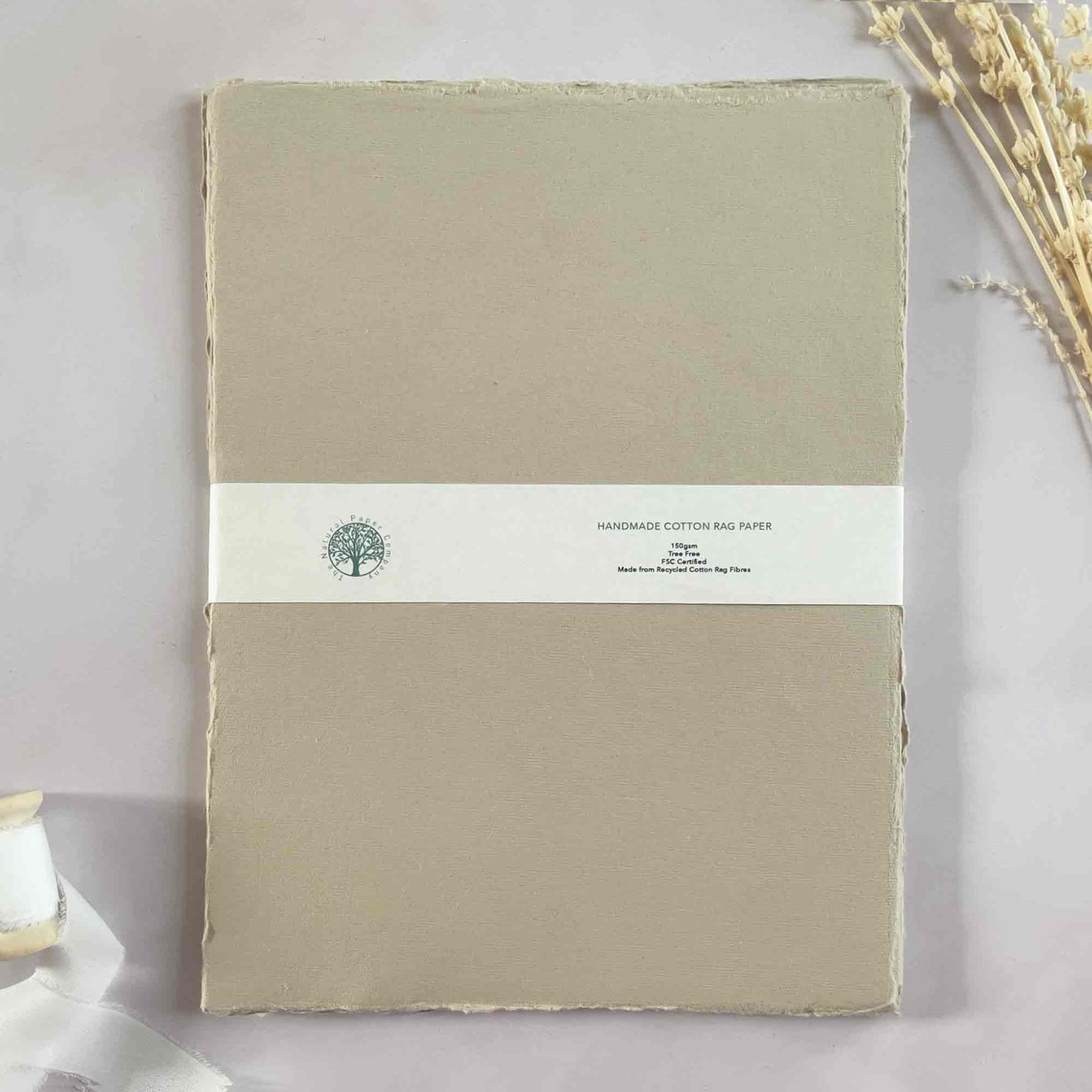 Pack of A4 handmade cotton rag paper in Mushroom.  Sheets of recycled handmade paper with deckled edges.  By The Natural Paper Company