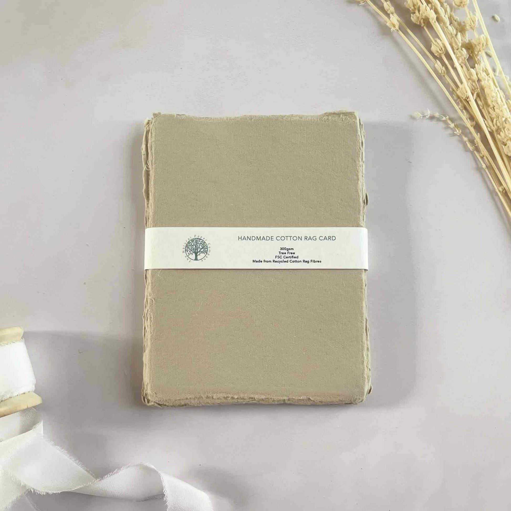 Handmade cotton rag card in mushroom colour.  5 x 7 sheets of deckled edge card in beige.  Handmade Card By The Natural Paper Company