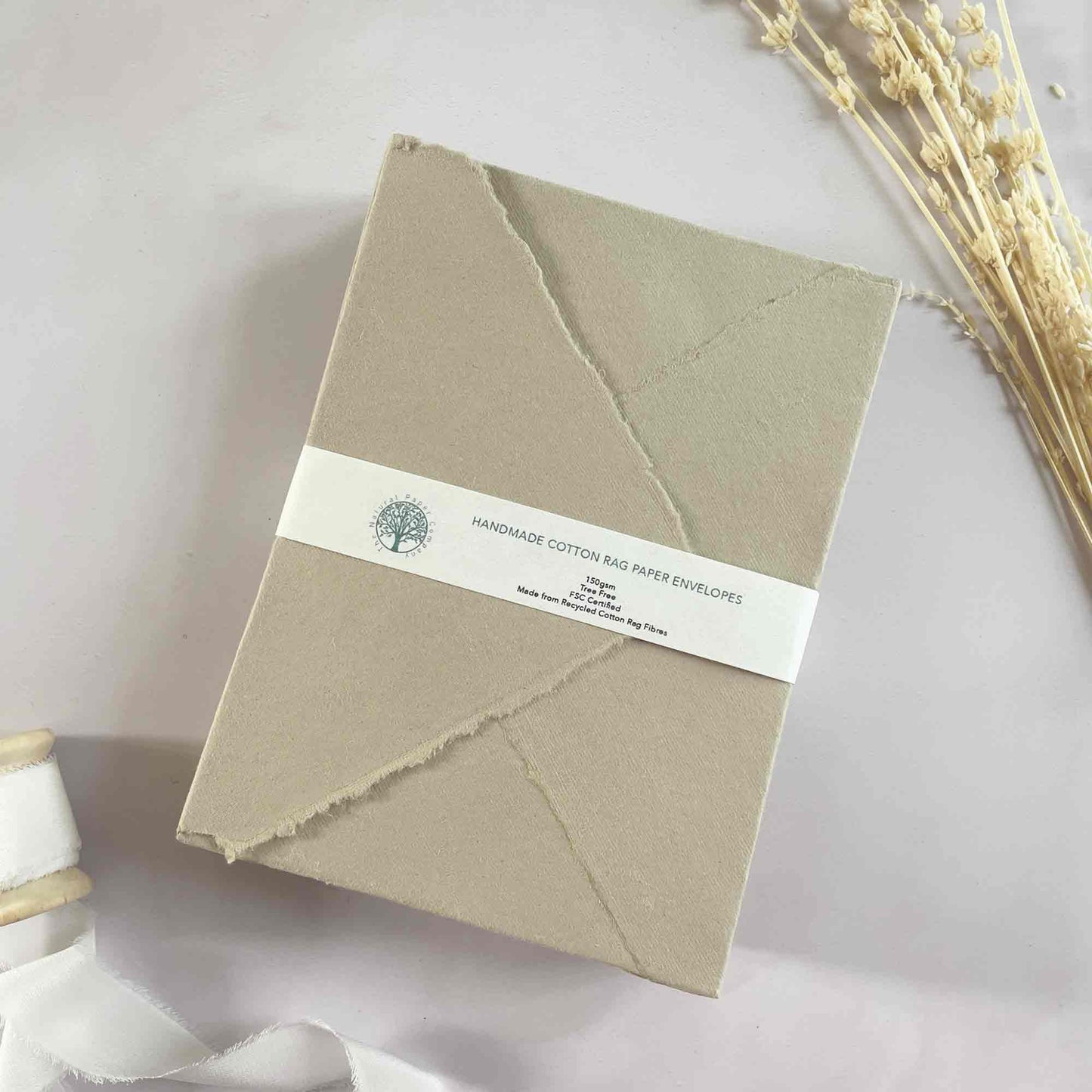 Mushroom handmade paper envelopes with deckle edge pointed flap.  Beige cotton rag paper envelopes by The Natural Paper Company