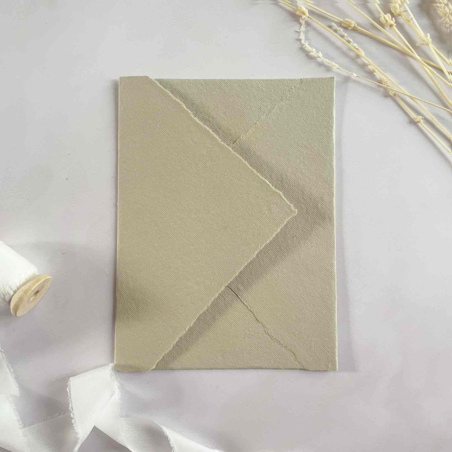 Beige handmade cotton rag paper envelopes.  Handmade envelopes with deckled edges.  Perfect for invitations.  By The Natural Paper Company