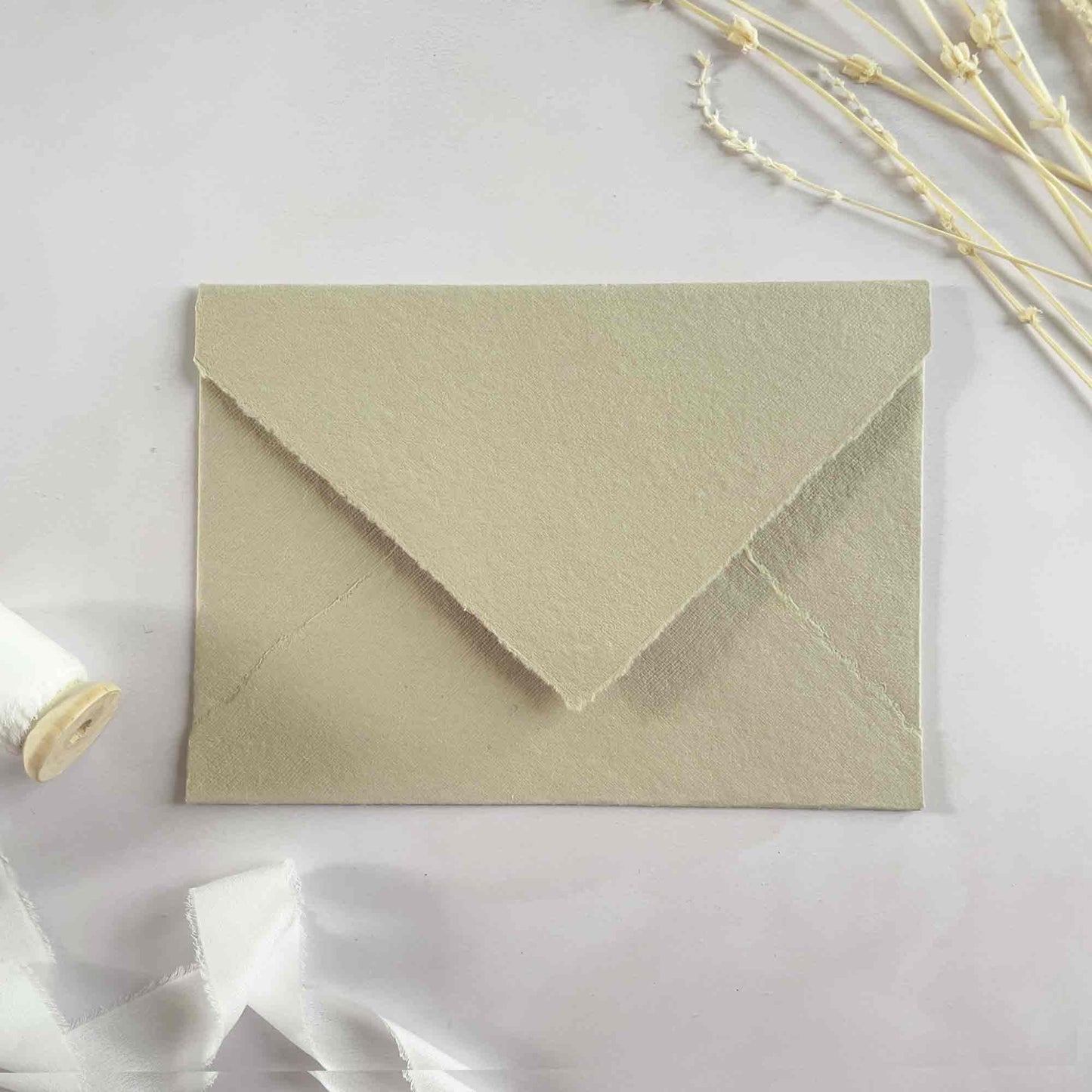 mushroom handmade cotton rag paper envelope with deckled edges.  Handmade invitation envelope in beige.  By The Natural Paper Company