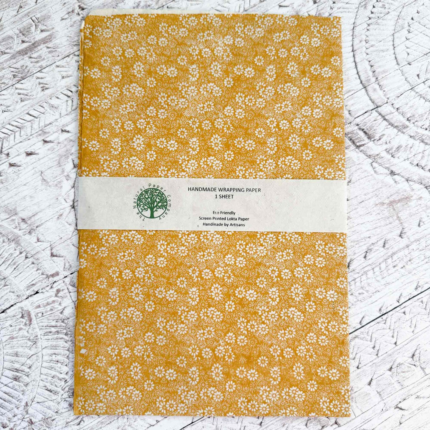 Handmade wrapping paper sheet with daisy pattern 