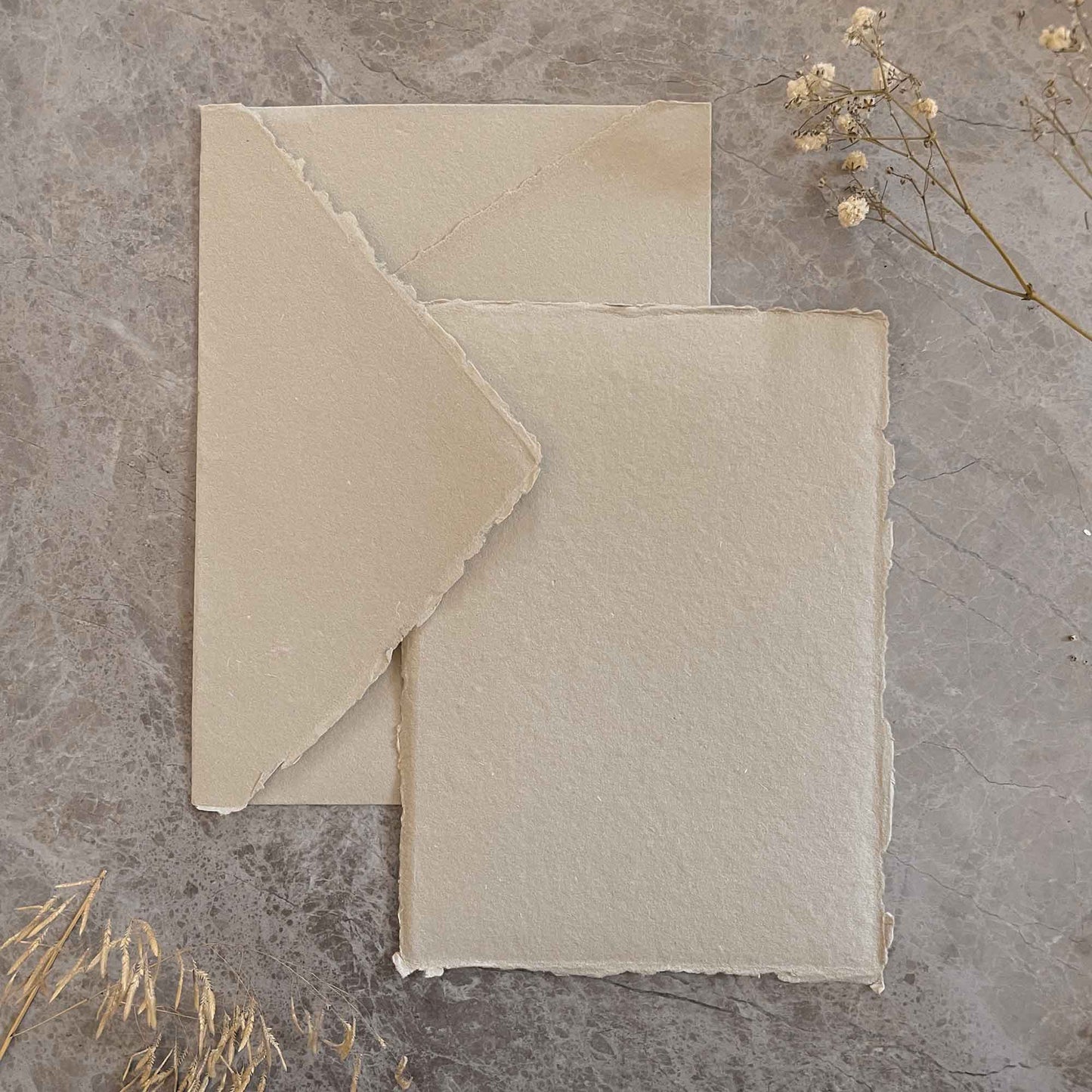 natural handmade paper and envelope made from recycled cotton rag fibres.  By The Natural Paper Company