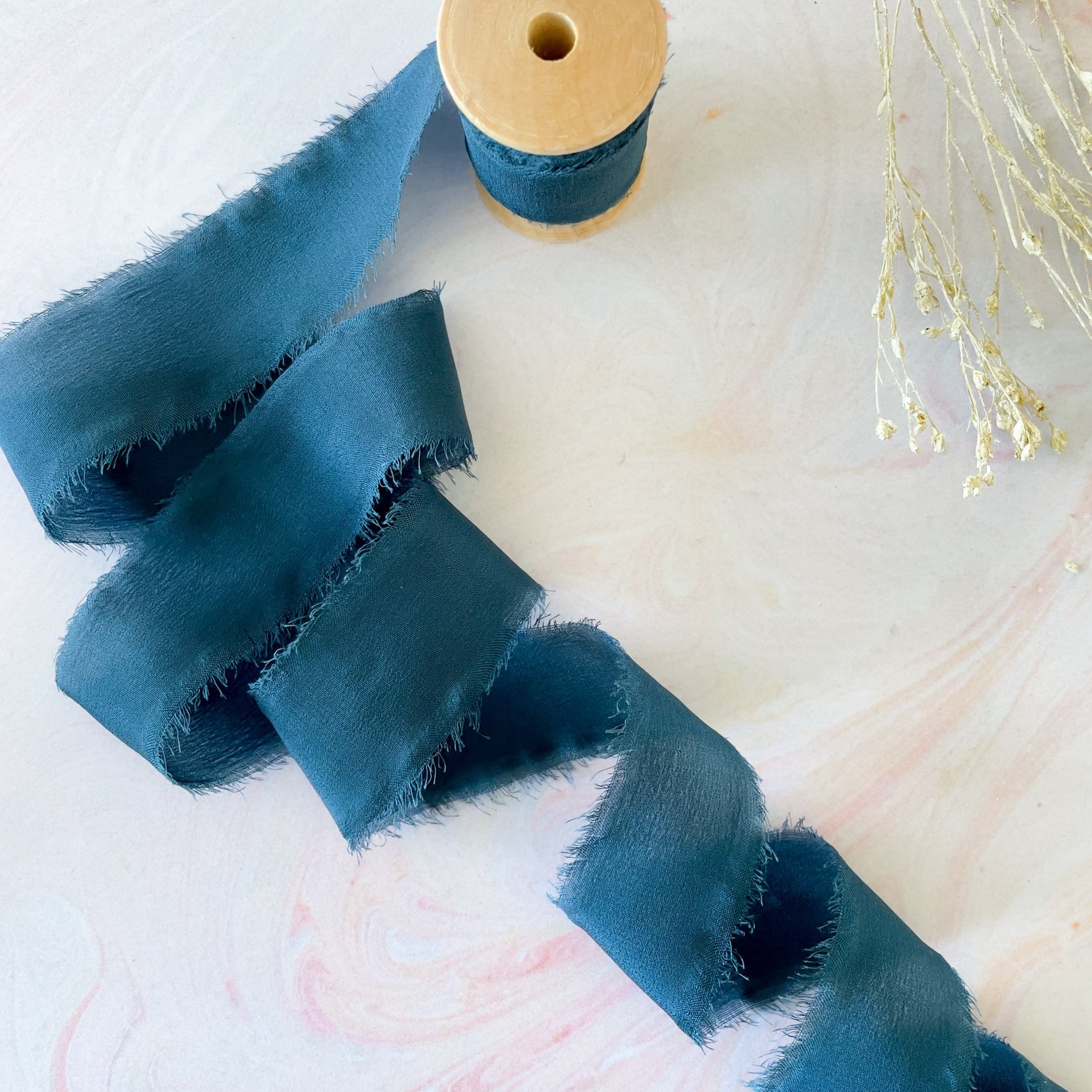 Navy silk ribbon with a frayed edge.  Decorative silk ribbon for crafts.  By The Natural Paper Company