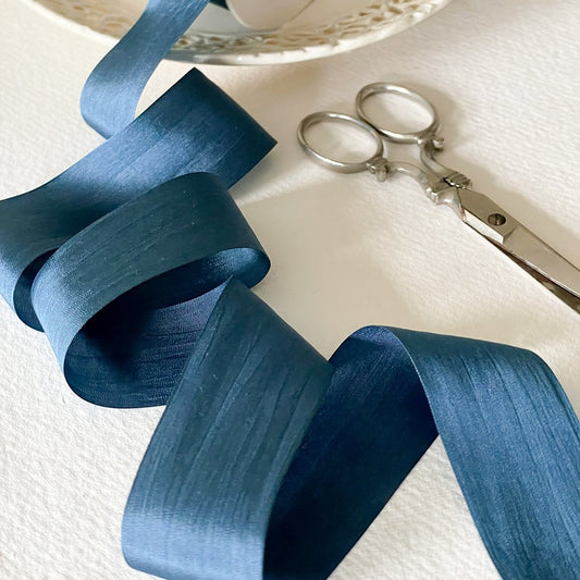 Navy silk ribbon for crafts.  Fine habotai silk ribbon for crafts.  Sold by the meter.  By The Natural Paper Company