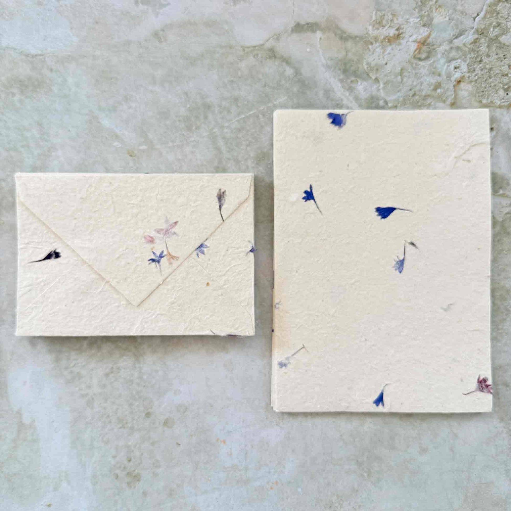 handmade lokta paper and envelope set with cornflower petals