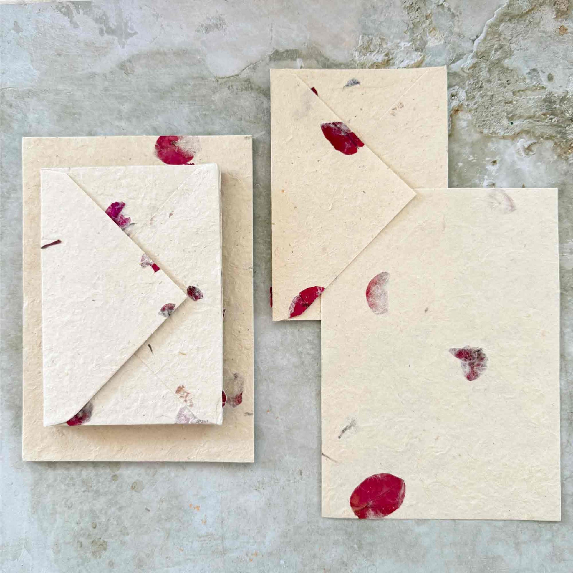Handmade Lokta Paper and envelope set with pressed flowers.  Bougainvillea petal decoration.