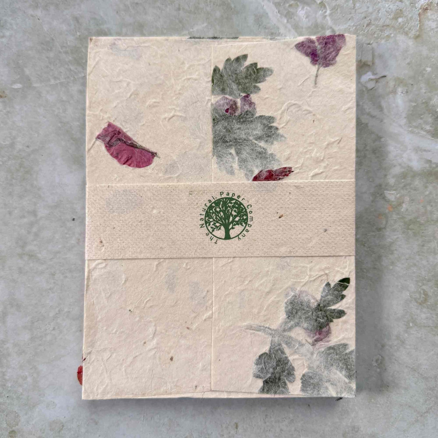 5"x7" invitation envelopes made from Lokta paper with mugwort and bougainvillea petals