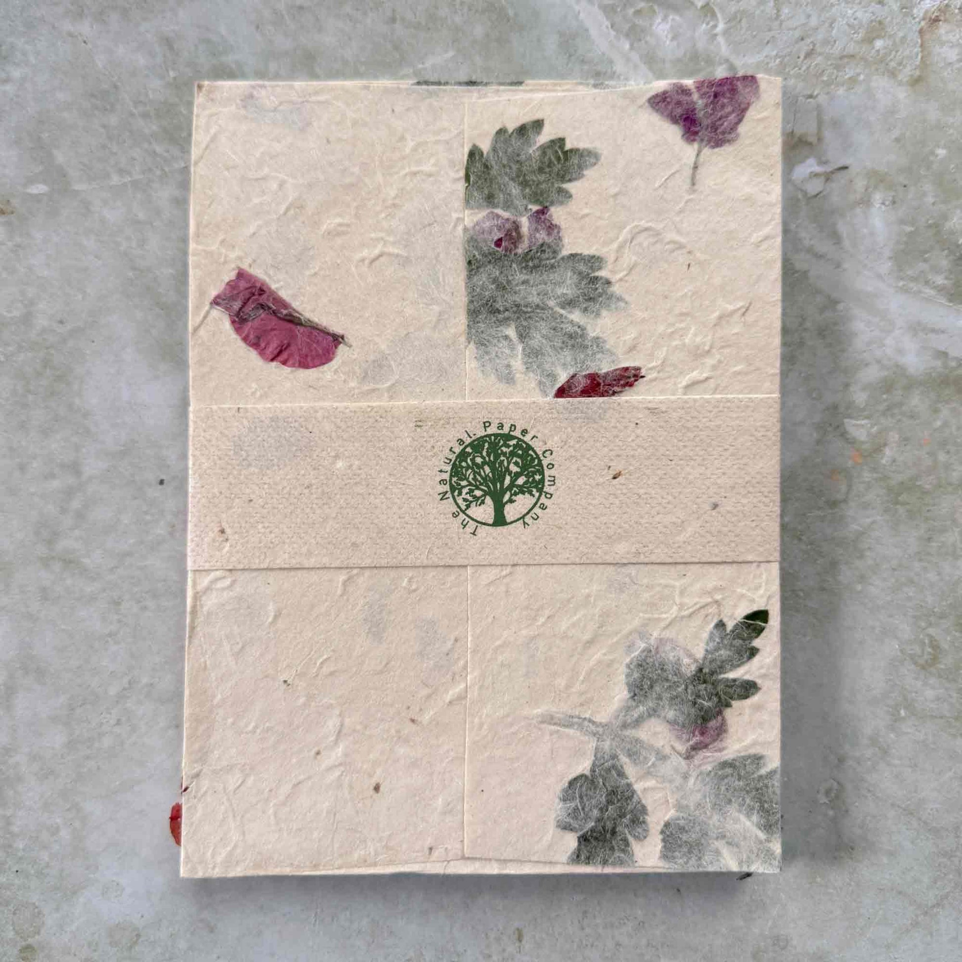 5"x7" invitation envelopes made from Lokta paper with mugwort and bougainvillea petals