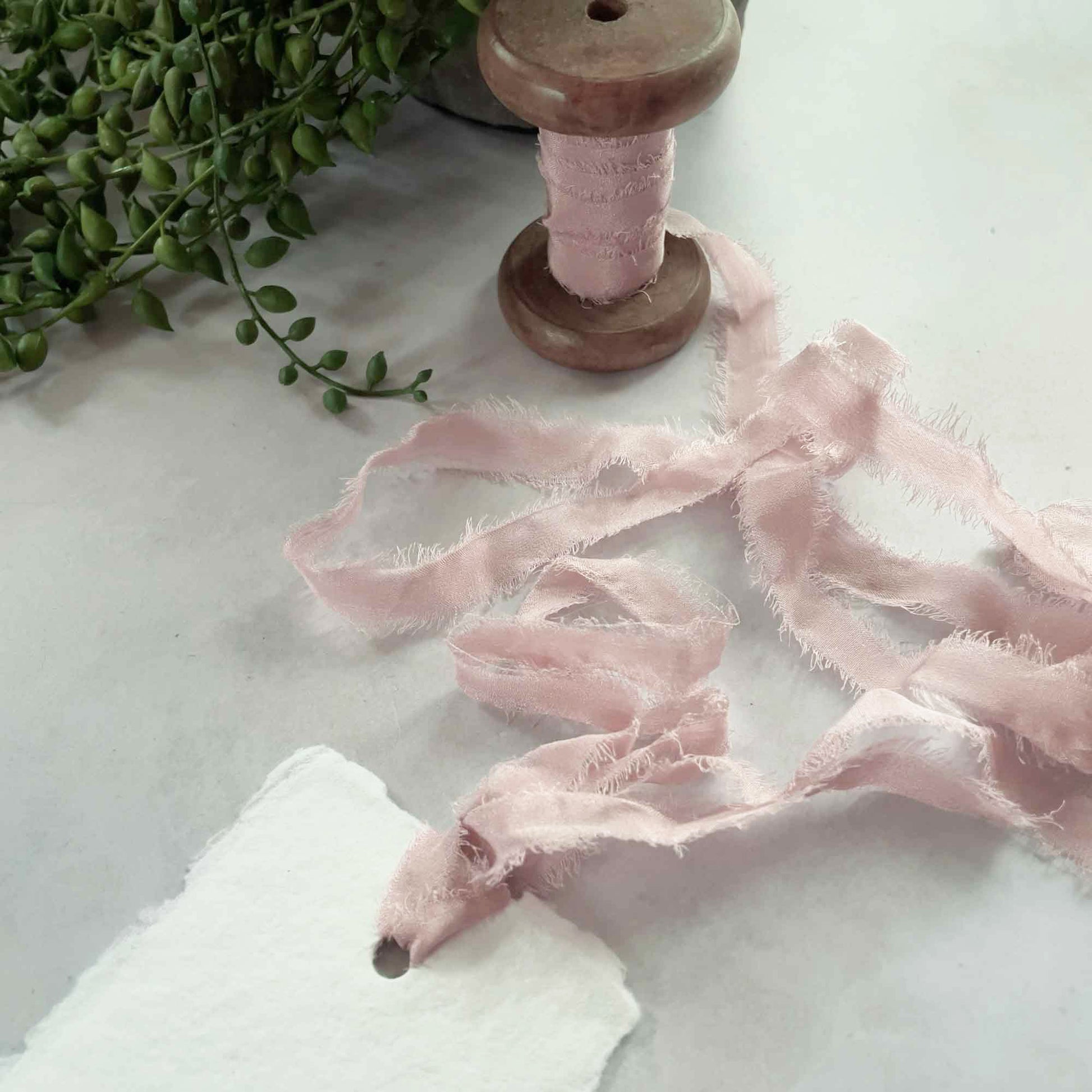 Narrow silk ribbon for place cards and tags.  Blush pink silk ribbon with a frayed edge