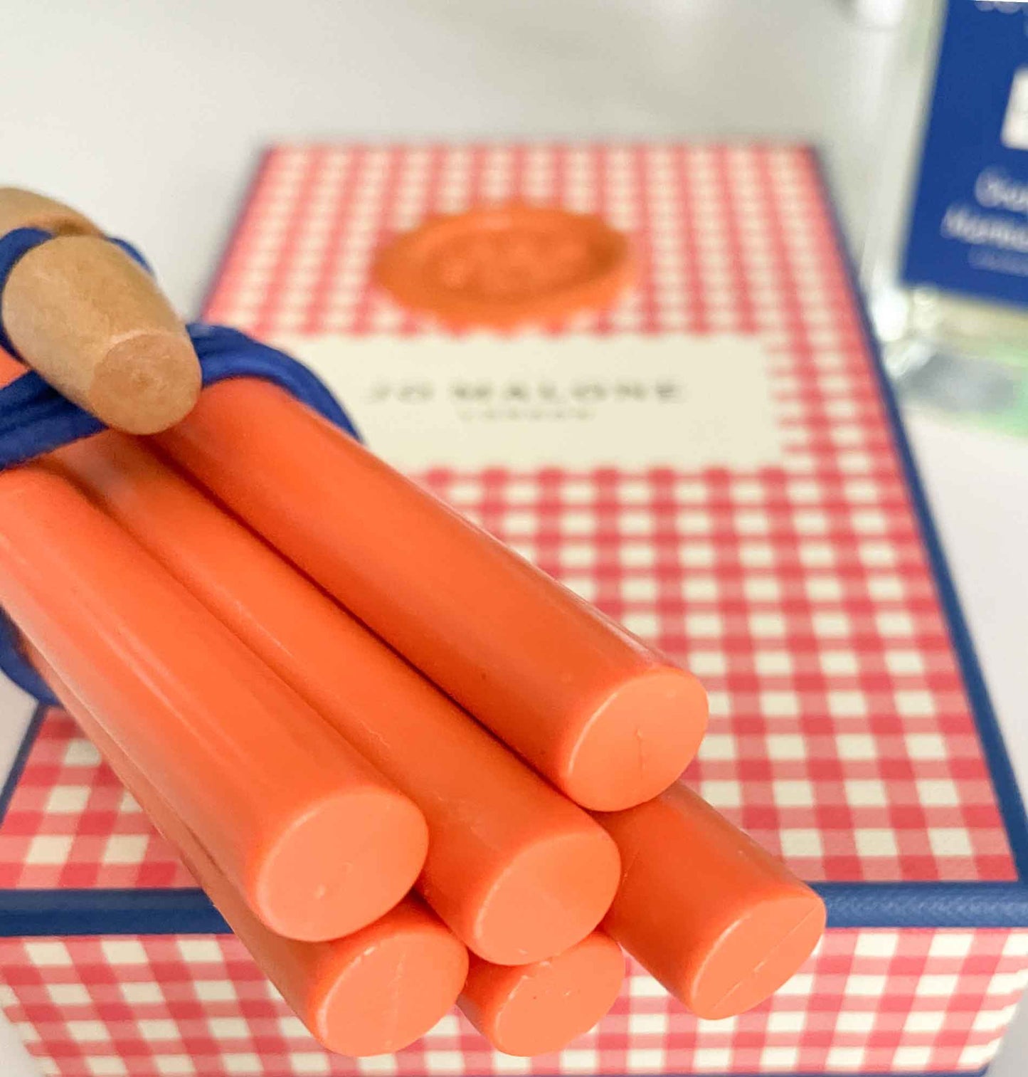 Orange Marmalade Sealing wax sticks by The Natural Paper Company.  Eco friendly sealing wax.  Paraffin Free, Plastic free and fully biodegradable wax seal wax.  Used by Jo Malone London for Orange Marmalade limited edition campaign