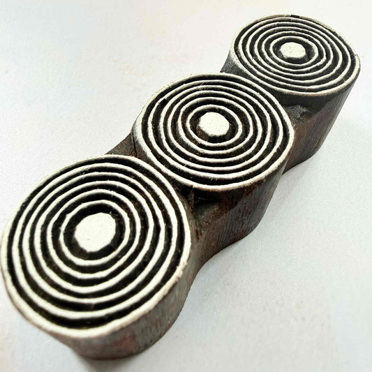 Orbits wooden stamp — three connected concentric circles viewed from side, handcrafted Indian printing block with fine stepped rings