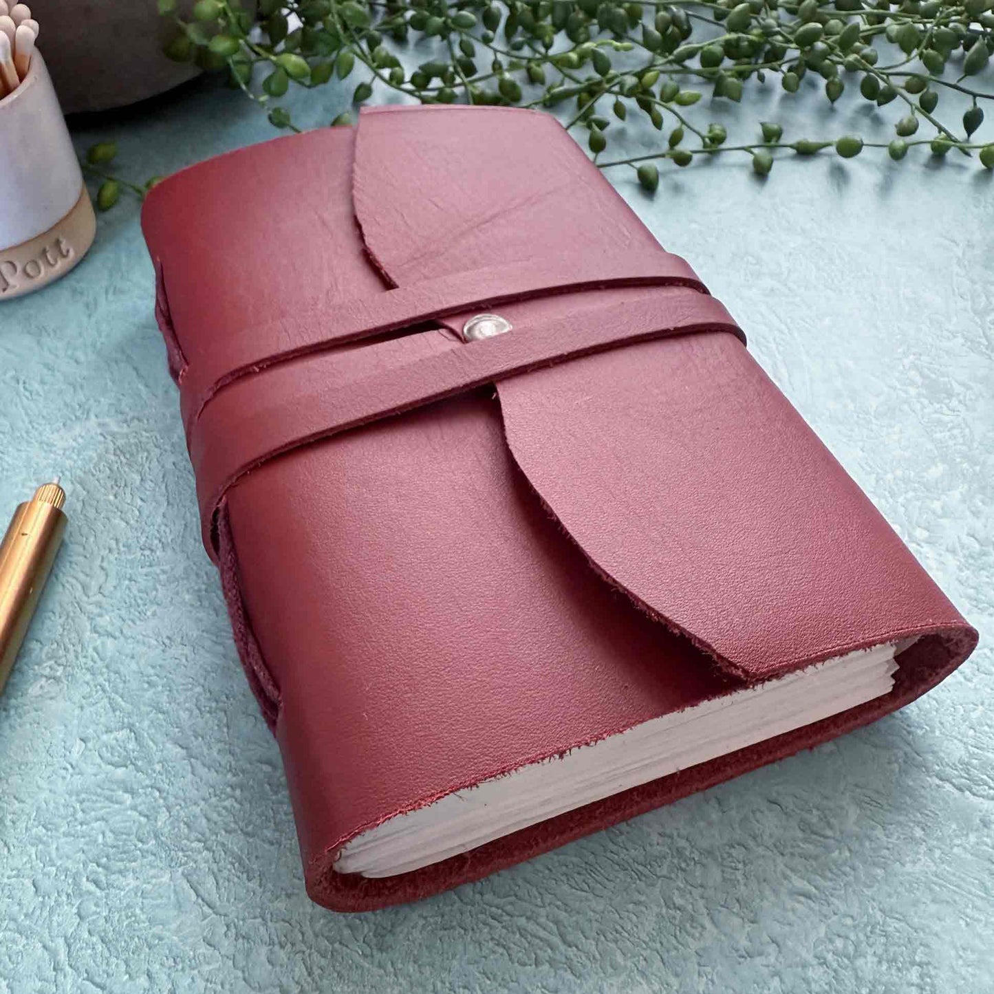 handmade oxblood leather journal with cotton paper pages