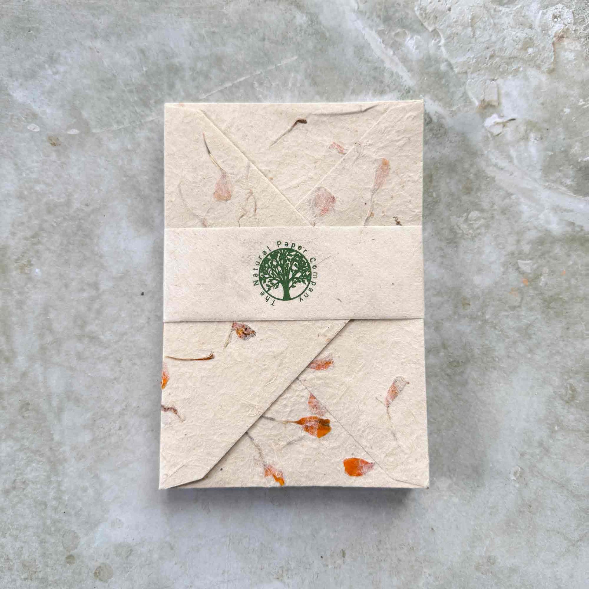 pack of C6 handmade paper envelopes made from lokta paper with marigold flowers