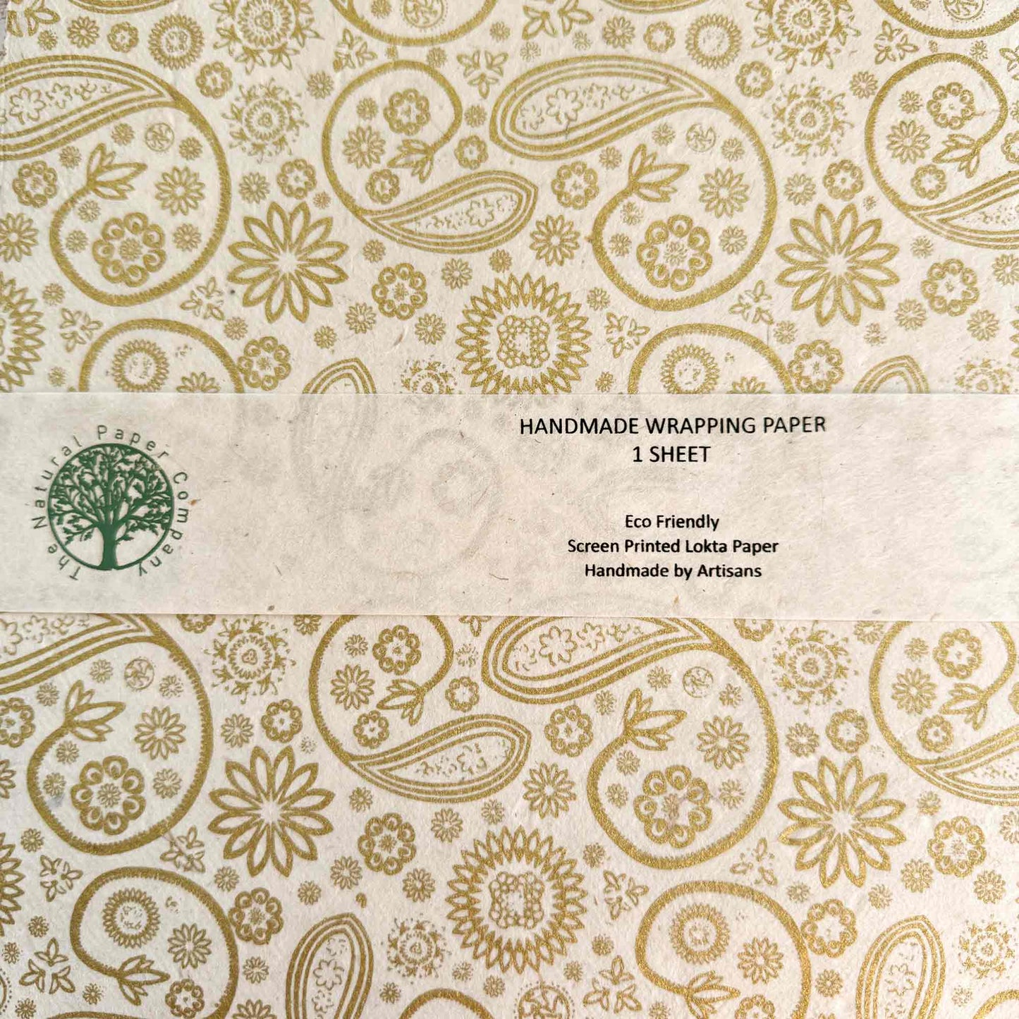 Handmade wrapping paper with gold floral and paisley patterns on a beige background, made from Lokta paper
