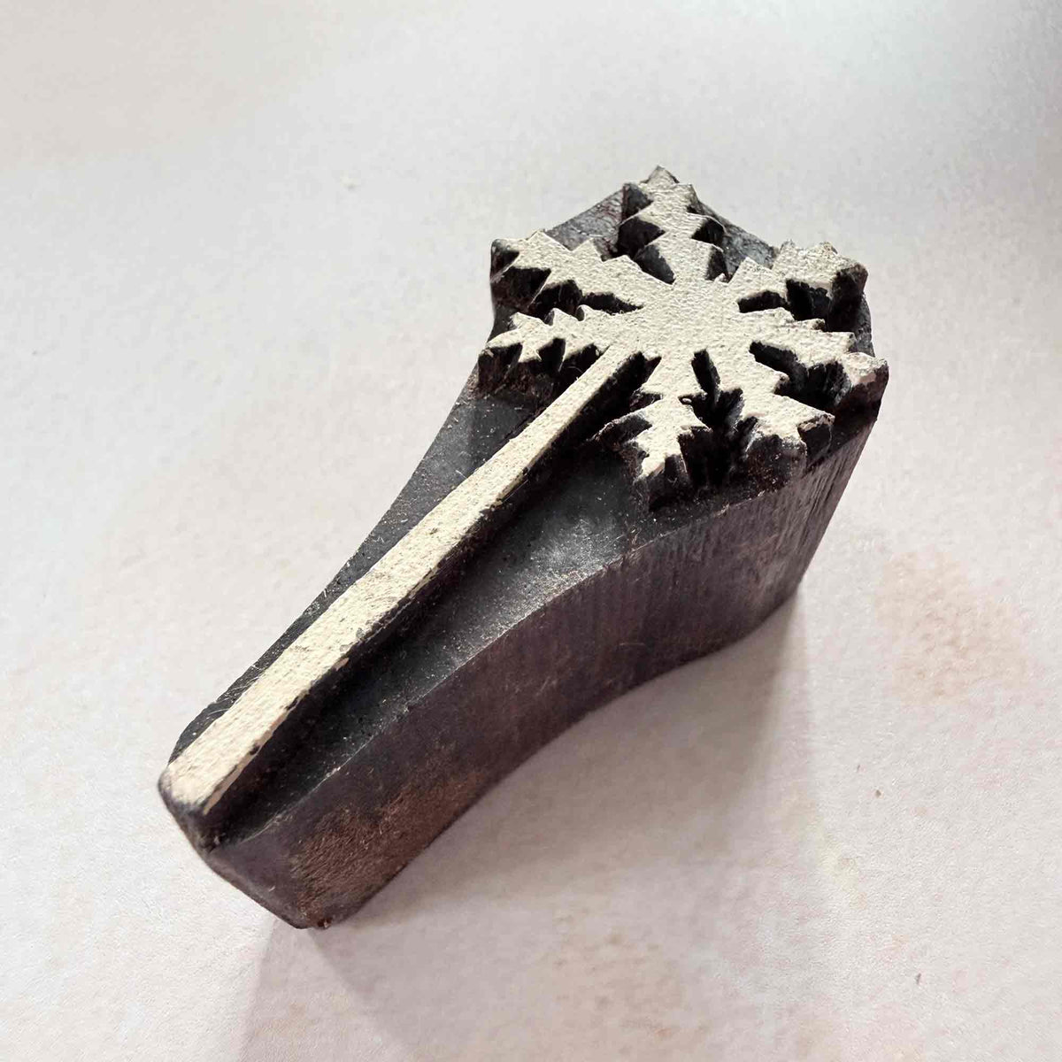 Palm Tree Indian wood block stamp shown from an angled side view