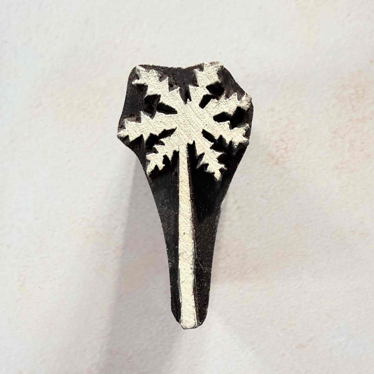 Indian wooden printing block with hand-carved palm tree design