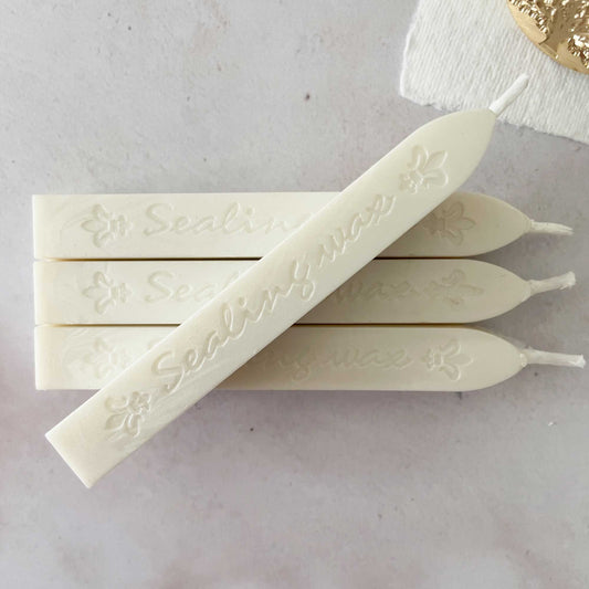 pearlised ivory sealing wax sticks with wick.  Bridal white sealing wax for stamps and seals