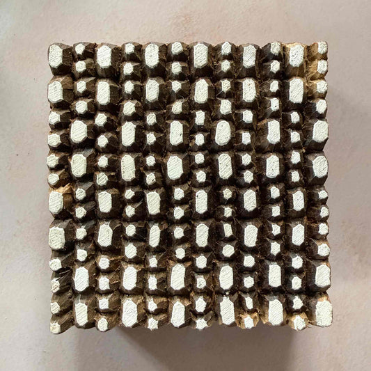 Pebbles Indian Wood Block Stamp measuring 10.5 x 10 cm with a dense hand-carved pattern of irregular pebble-shaped printing marks.