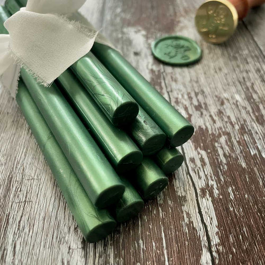 Pine green sealing wax sticks.  11mm Glue gun sealing wax stick made from eco friendly wax.  Plastic free, paraffin free and biodegradable.  By The Natural Paper Company