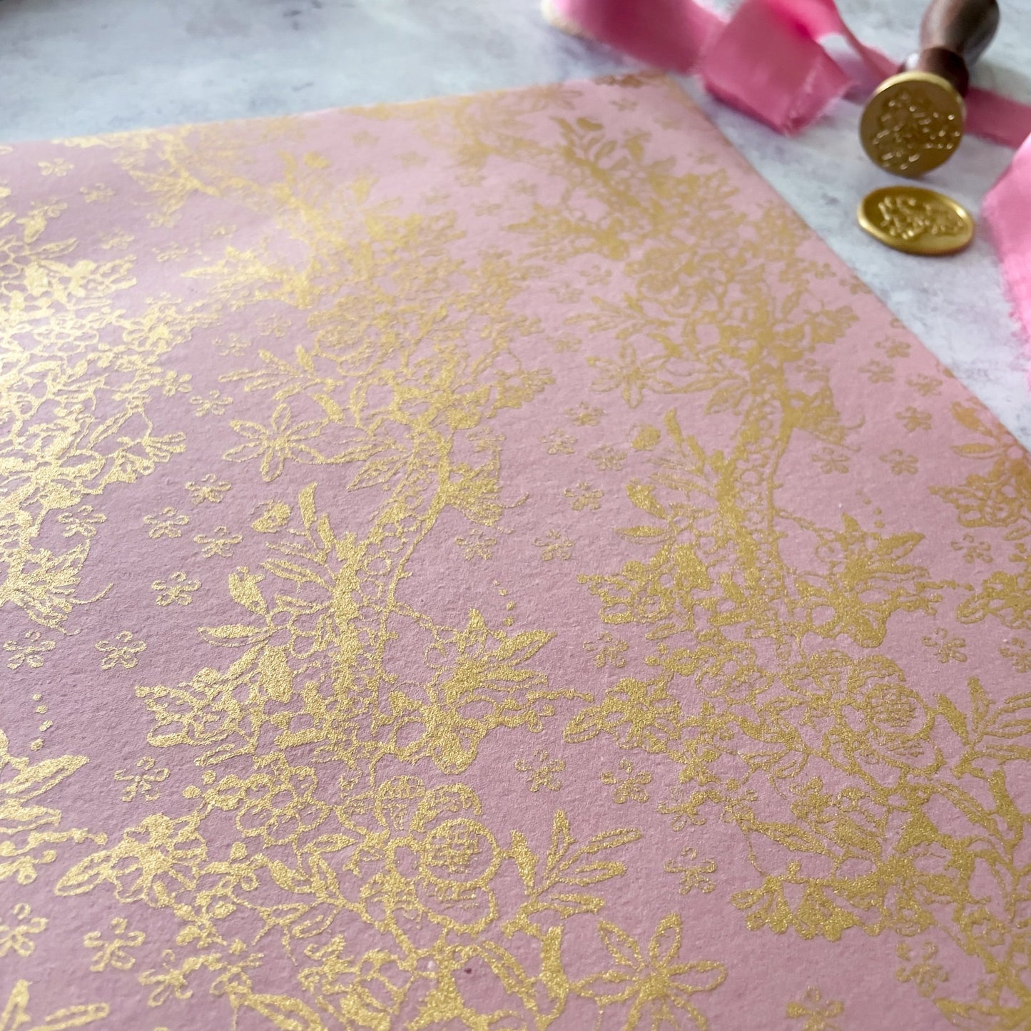 Fleur Lustre in Pink and Gold.  Decorative sheets of A4 recycled paper with a metallic gold pattern.  Perfect for crafts and DIY wedding stationery.  by The Natural Paper Company