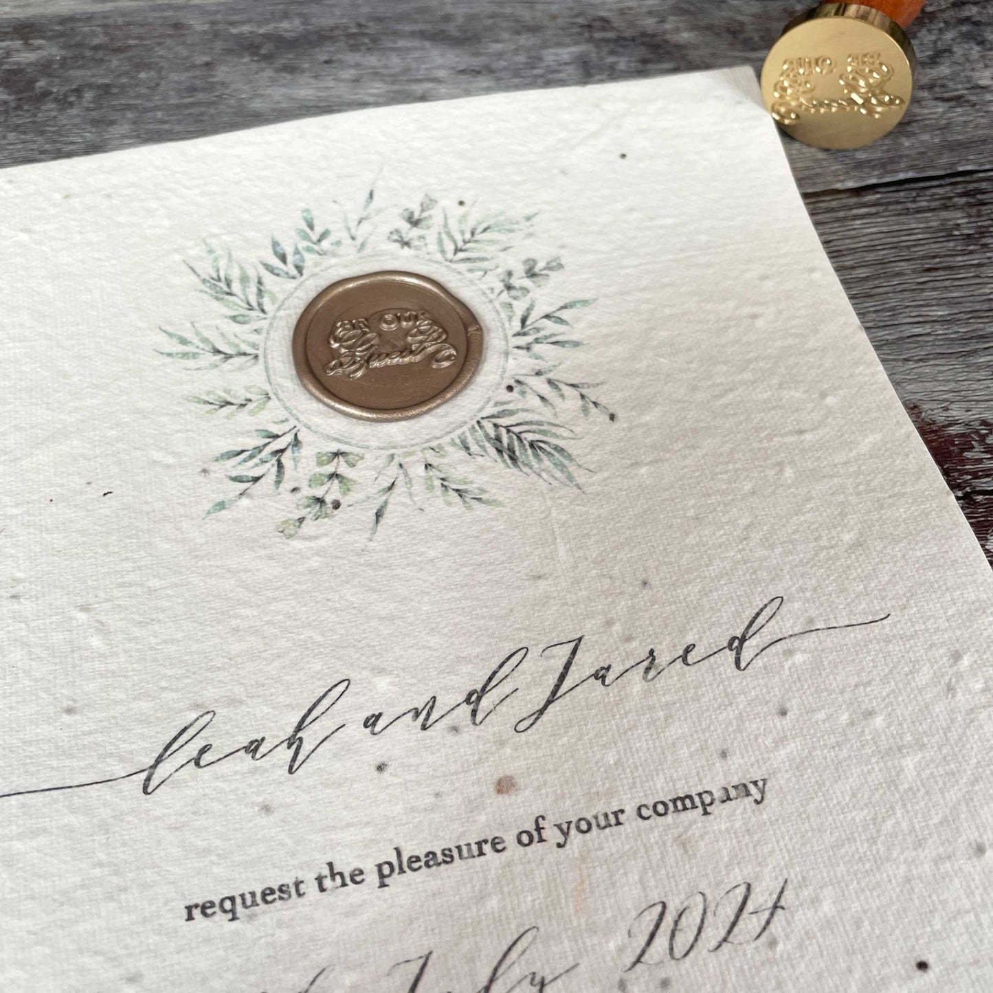 Invitation made from plantable paper with a biodegradable wax seal in gold.  Basil seed paper you can plant.  Perfect to make eco friendly invitations and stationery.  By The Natural paper Company